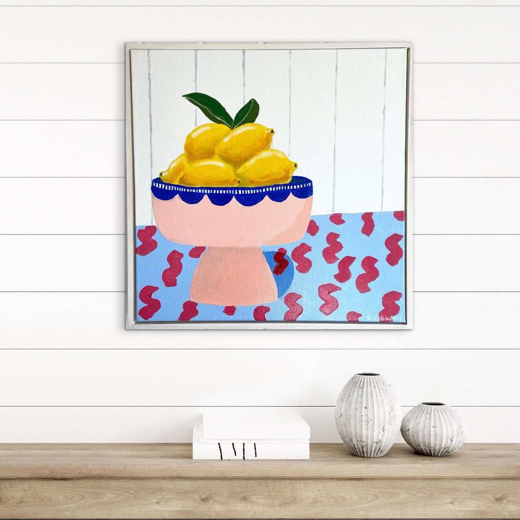 Framed artwork of a bowl of lemons