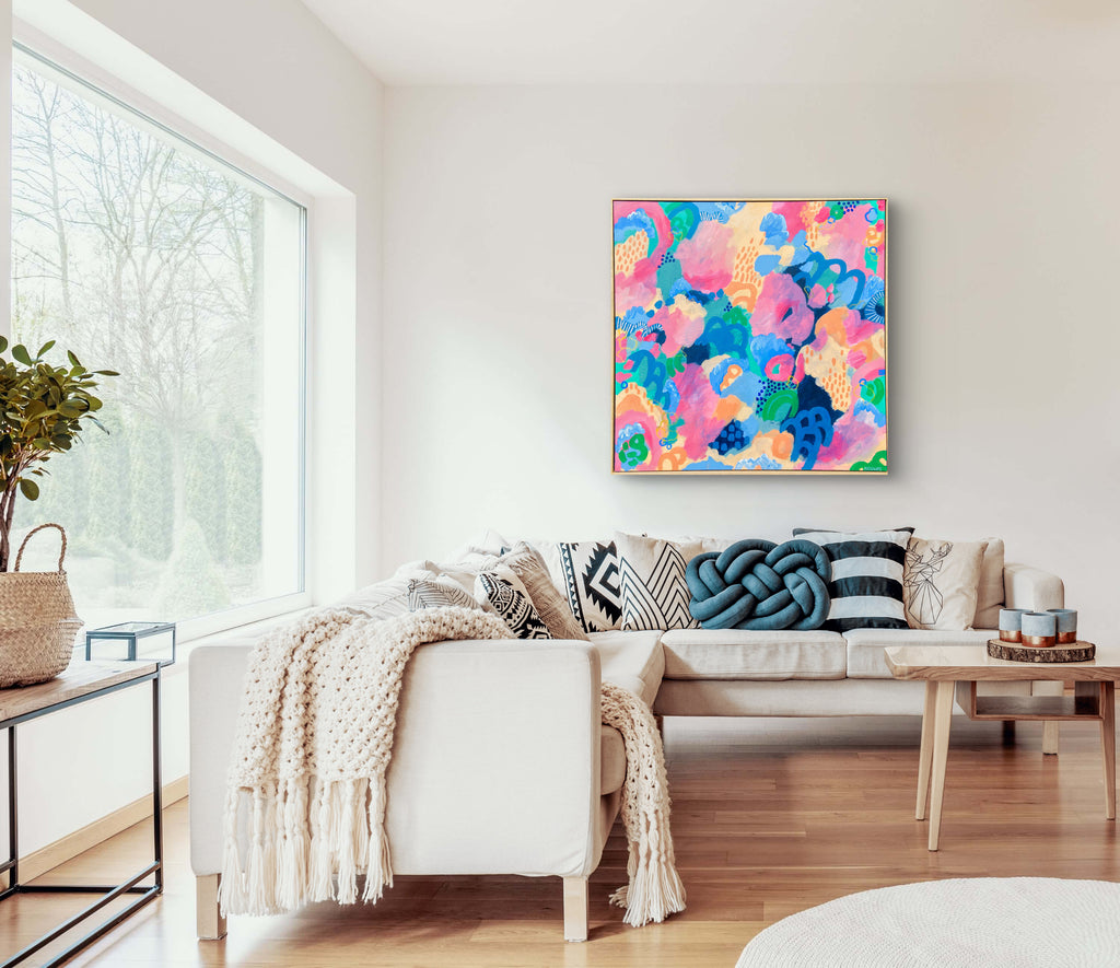 Living room with a colorful abstract painting on the wall